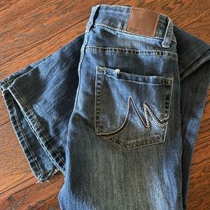 Maurice. Size 0 x-long. Slim fit. Boot cut. Snipped at the ankle.